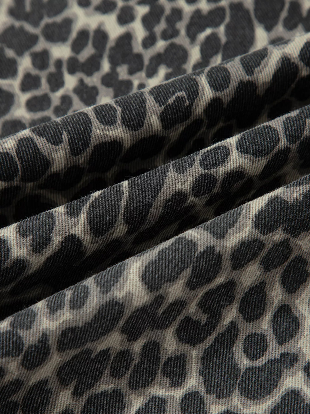 Leopard print high-rise barrel-leg jeans with pockets