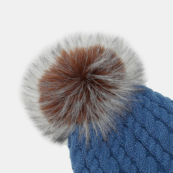 Braided cable knit pompom beanie with fold-over cuff