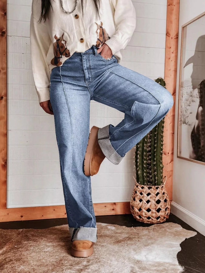 High-rise wide leg jeans with center seam and raw hem