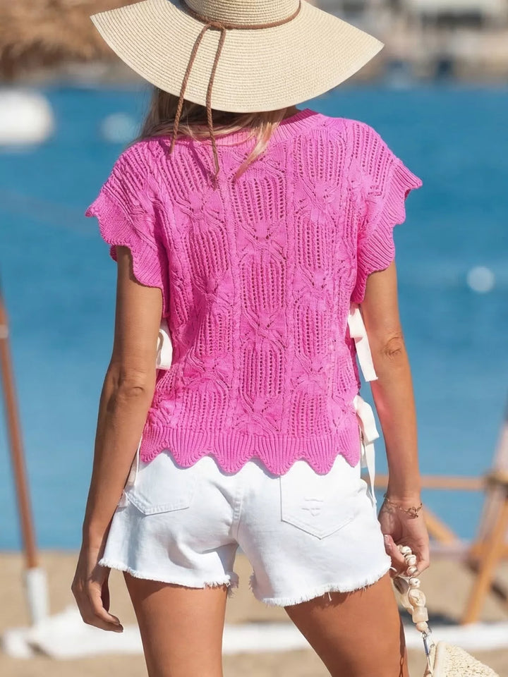 Openwork cable knit crop top with side ties and ruffle sleeves