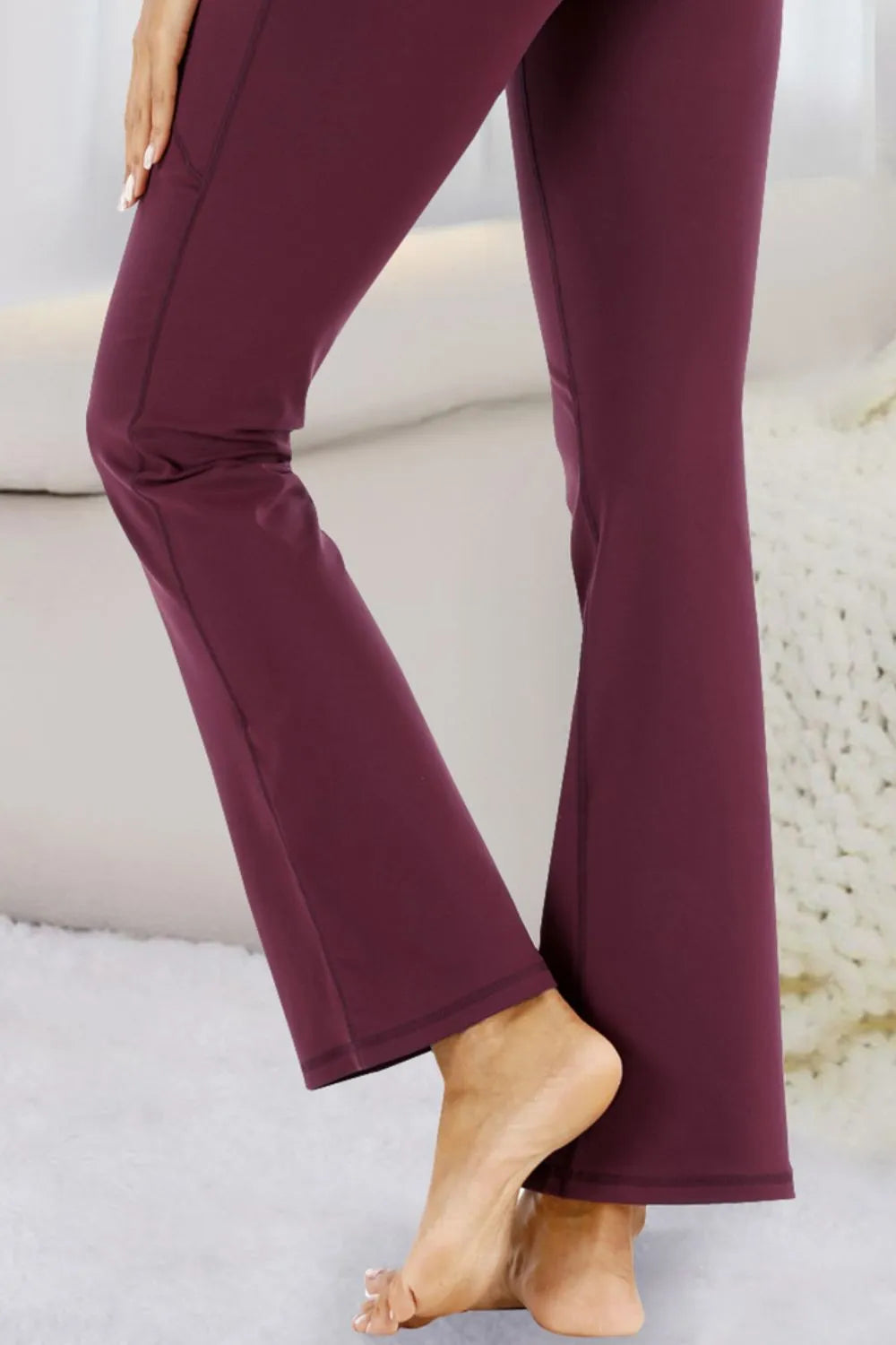 High-waisted flare yoga pants with side phone pockets