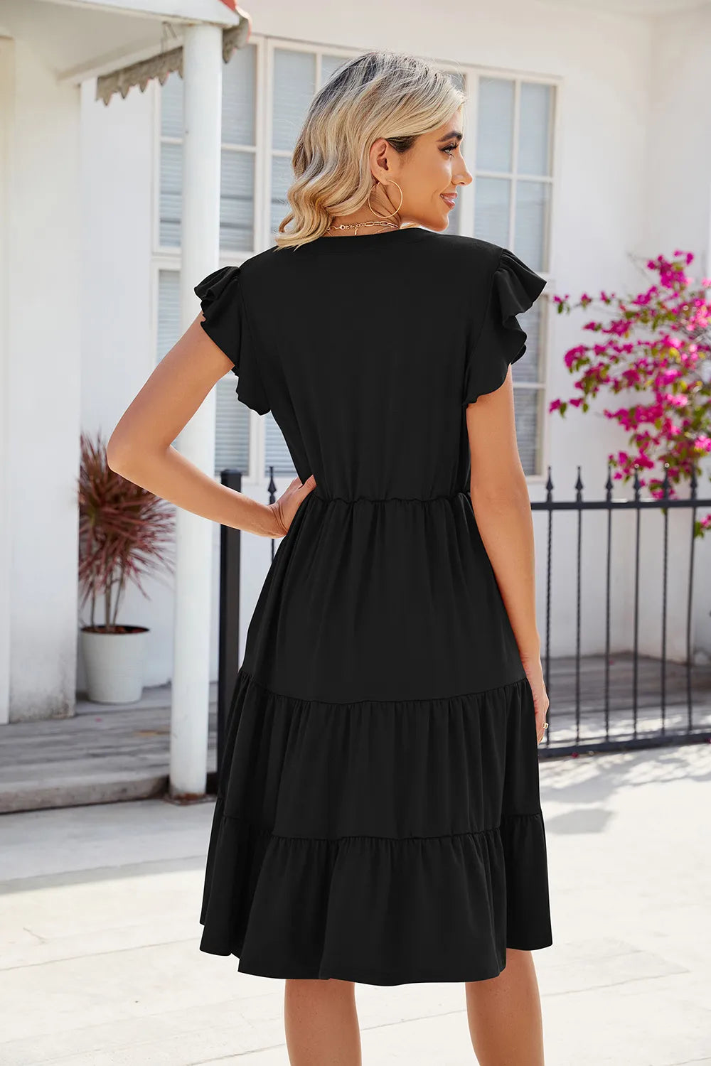 Flutter sleeve tiered midi dress with notched V-neck