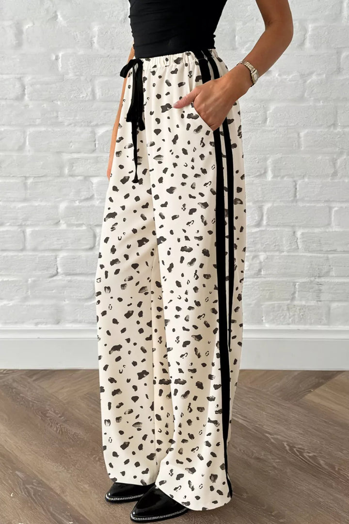 Leopard print wide-leg pants with side stripe and drawstring waist