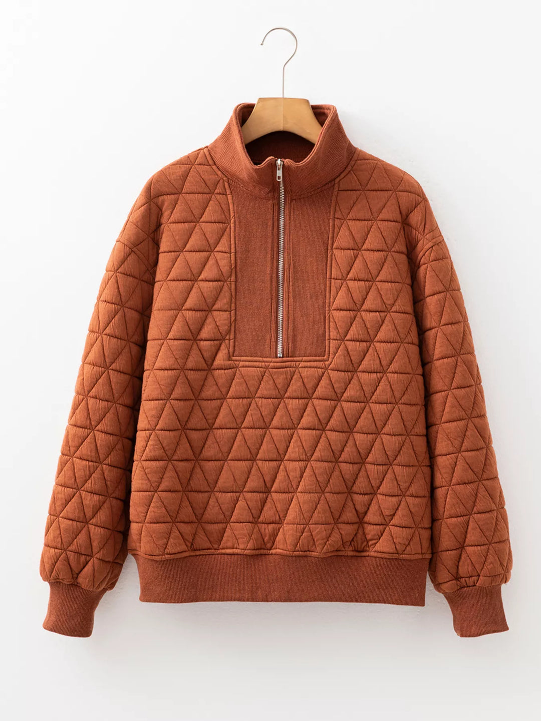 Geometric quilted half-zip pullover sweatshirt