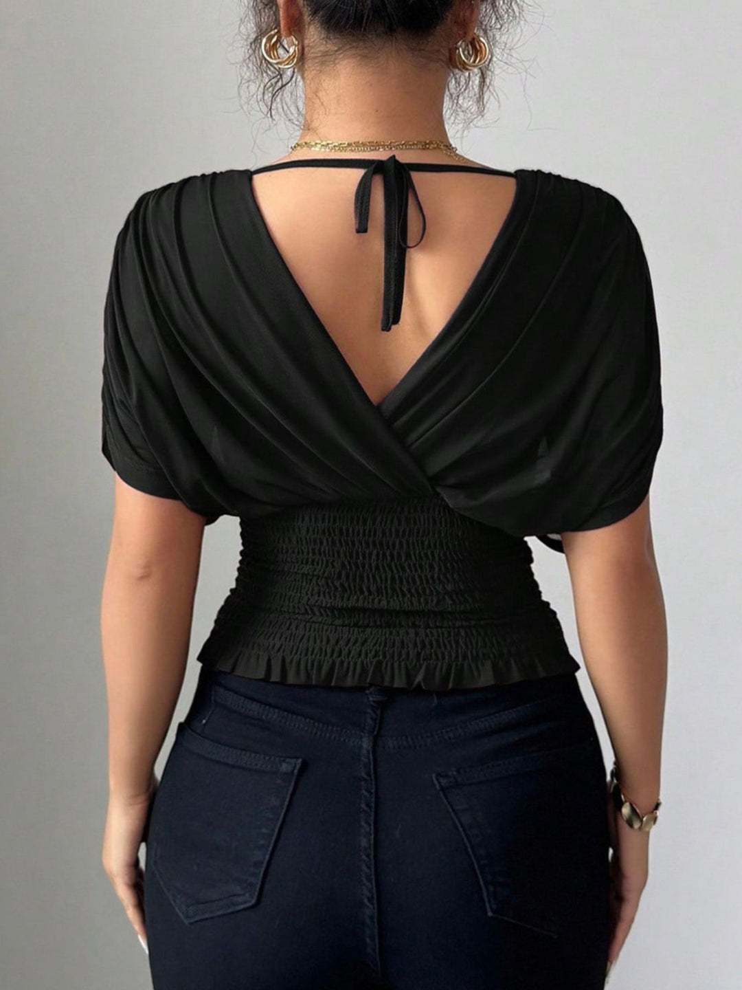 Ruched surplice wrap top with short dolman sleeves