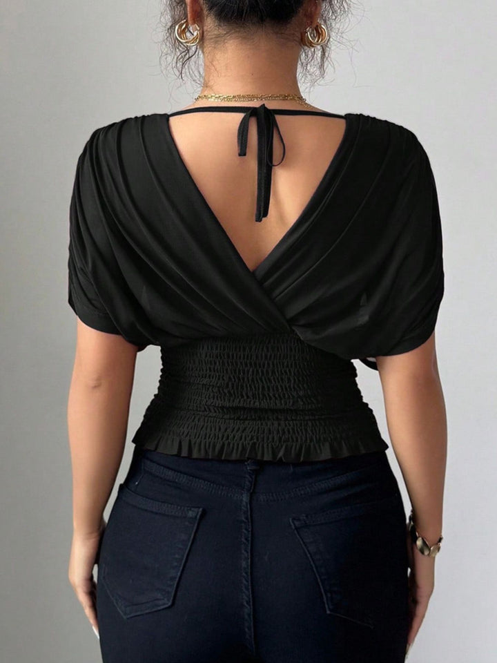 Ruched surplice wrap top with short dolman sleeves