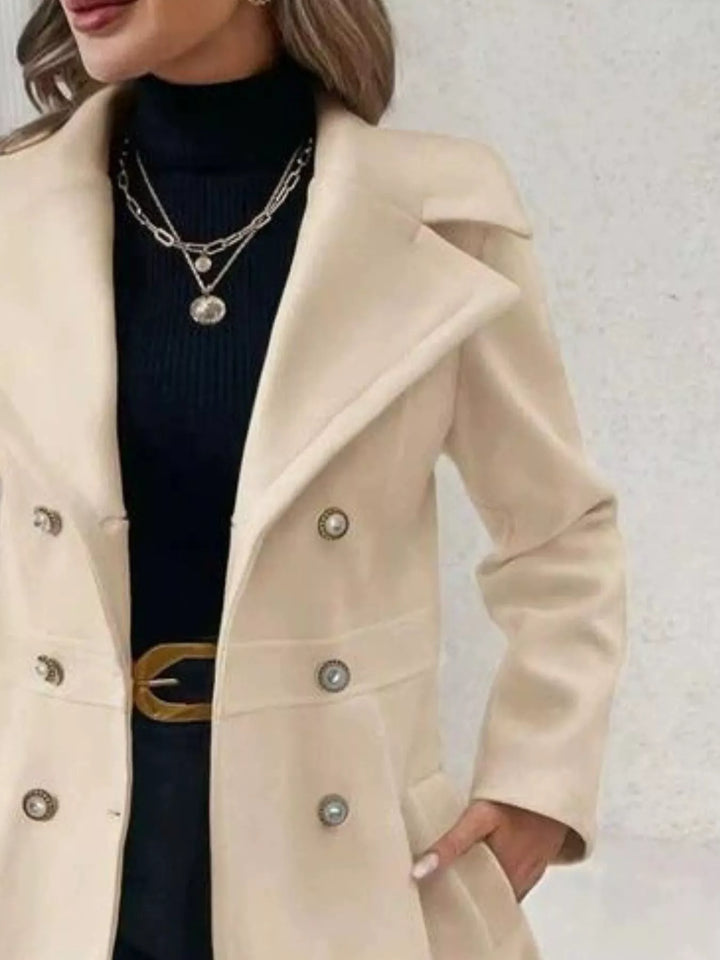 Double-breasted peplum coat with notch lapels and pockets