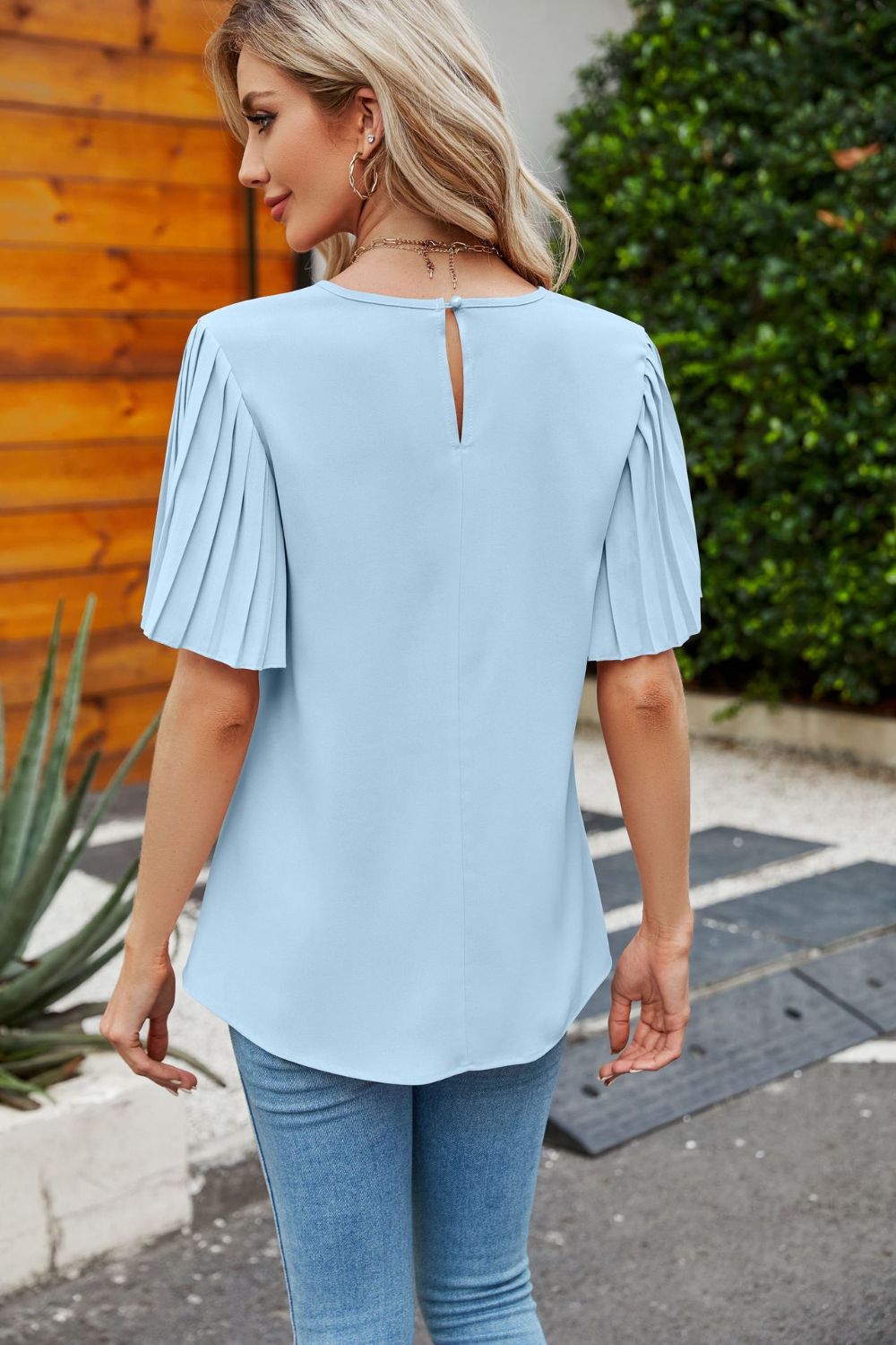 Pleated flutter sleeve round neck blouse