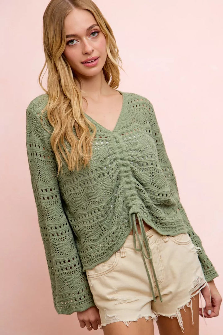 Long sleeve pointelle knit V-neck top with ruched front