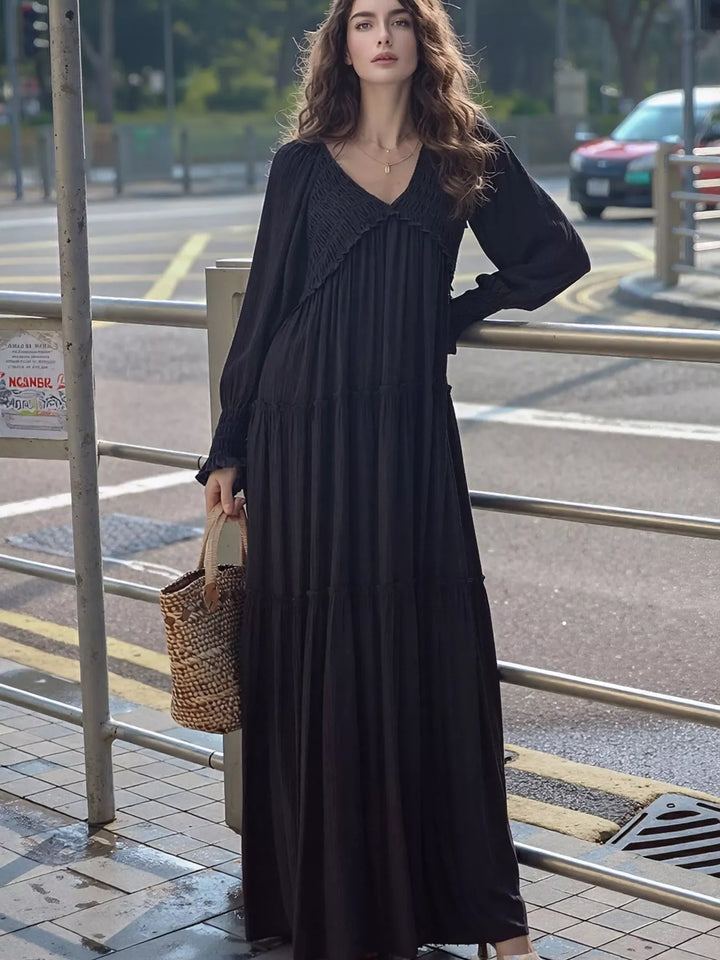 Black Smocked v-neck tiered maxi dress with long sleeves