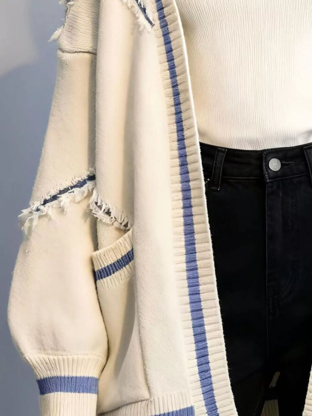 Frayed exposed-seam open front cardigan with striped trim