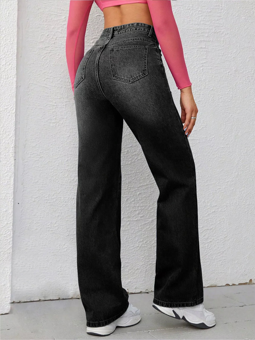 High-rise wide-leg washed jeans with whiskering