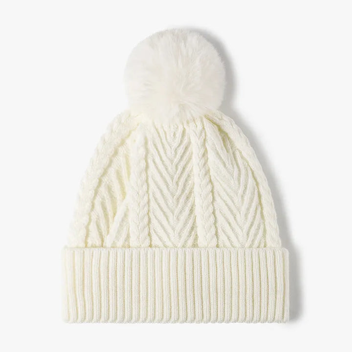 Cream Cable knit beanie with faux fur pompom and ribbed cuff