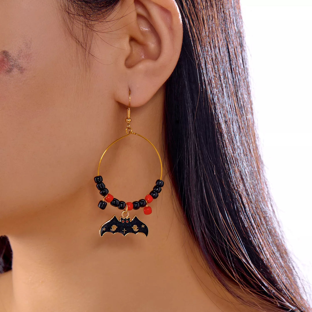 Beaded bat charm drop hoop earrings with ghost detail