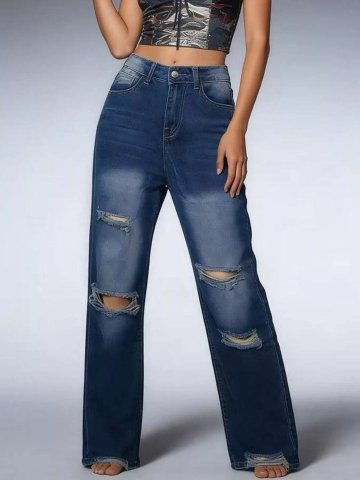 Distressed wide-leg jeans with raw frayed hem