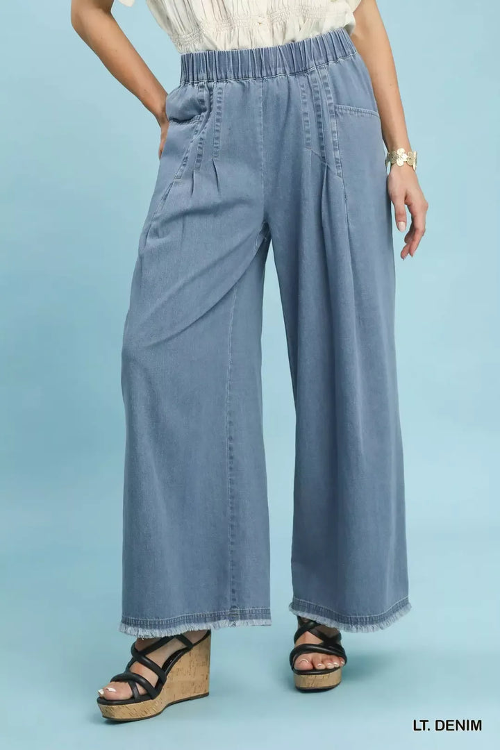 LT. DENIM Stone washed wide-leg cotton pants with raw frayed hem