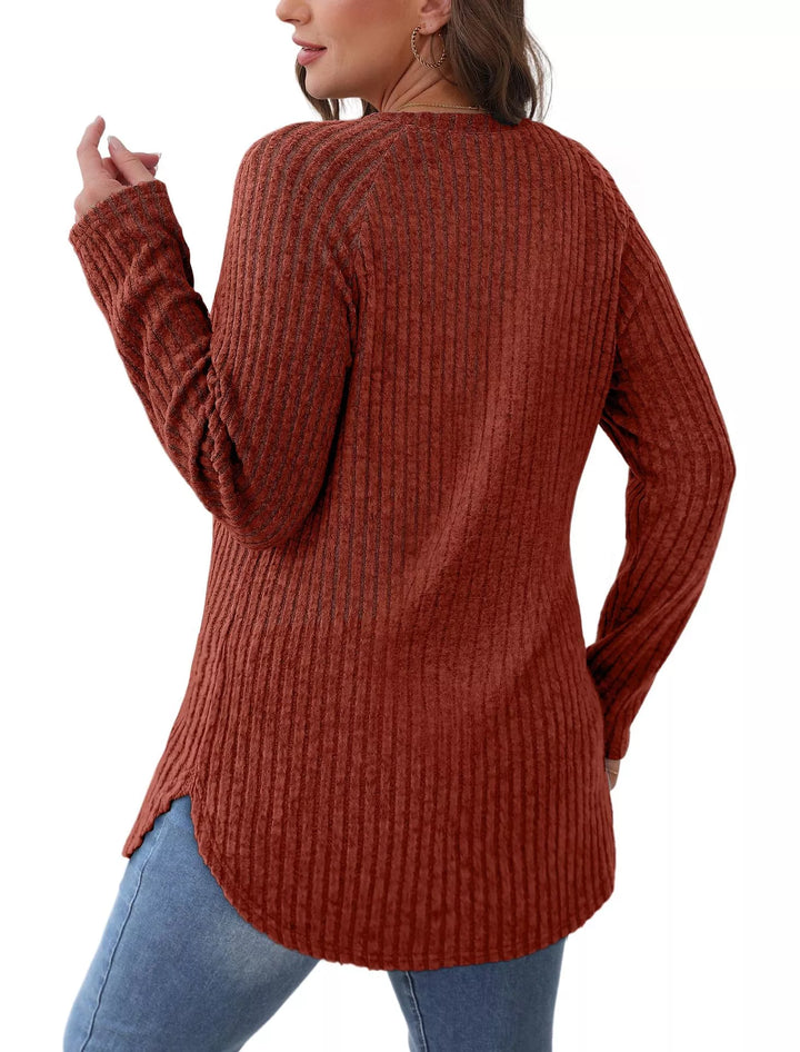 Ribbed knit crew neck long sleeve top with curved hem