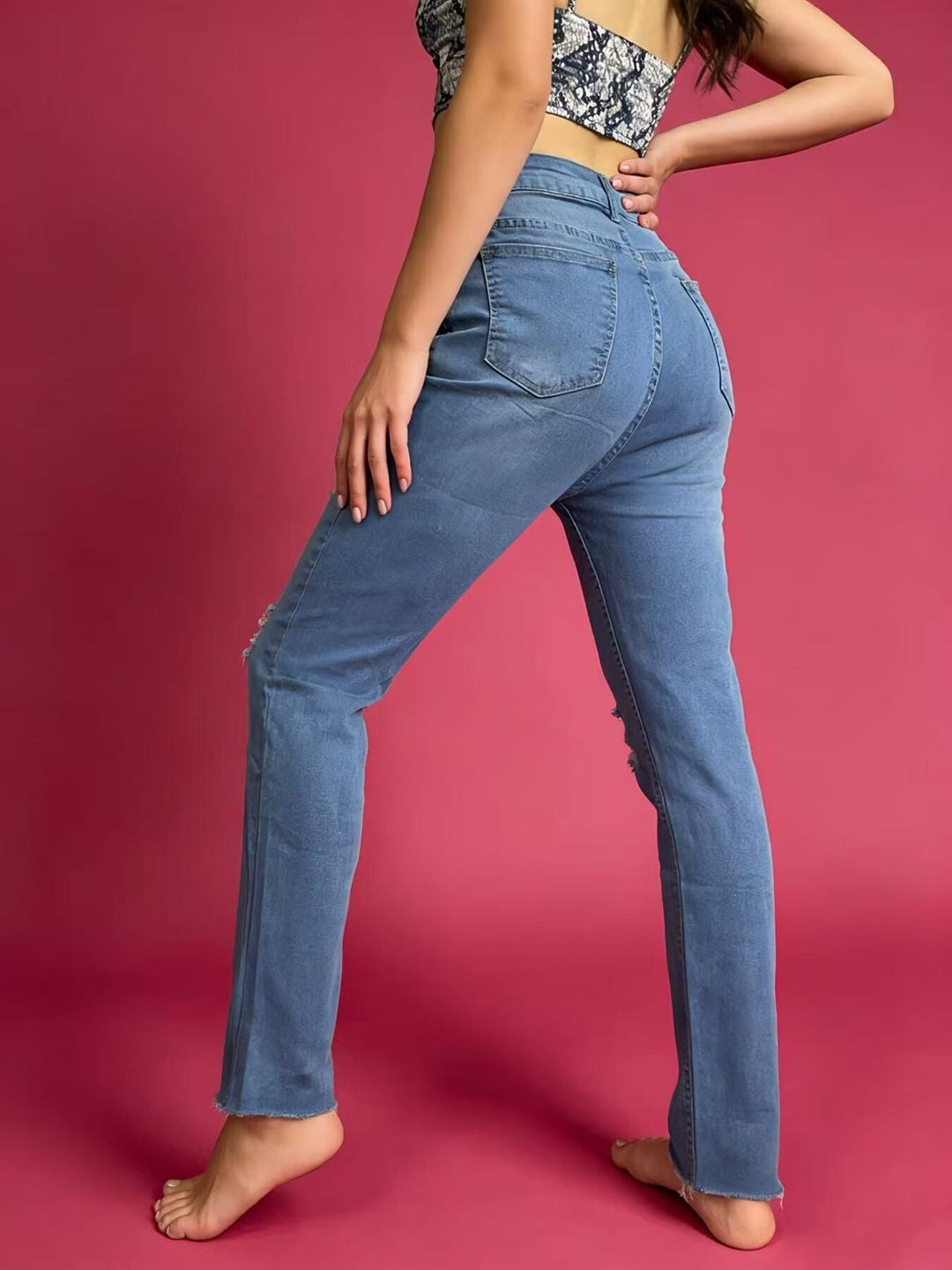 Distressed high-rise skinny jeans with frayed hem