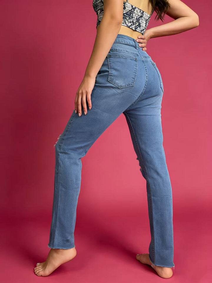 Distressed high-rise skinny jeans with frayed hem