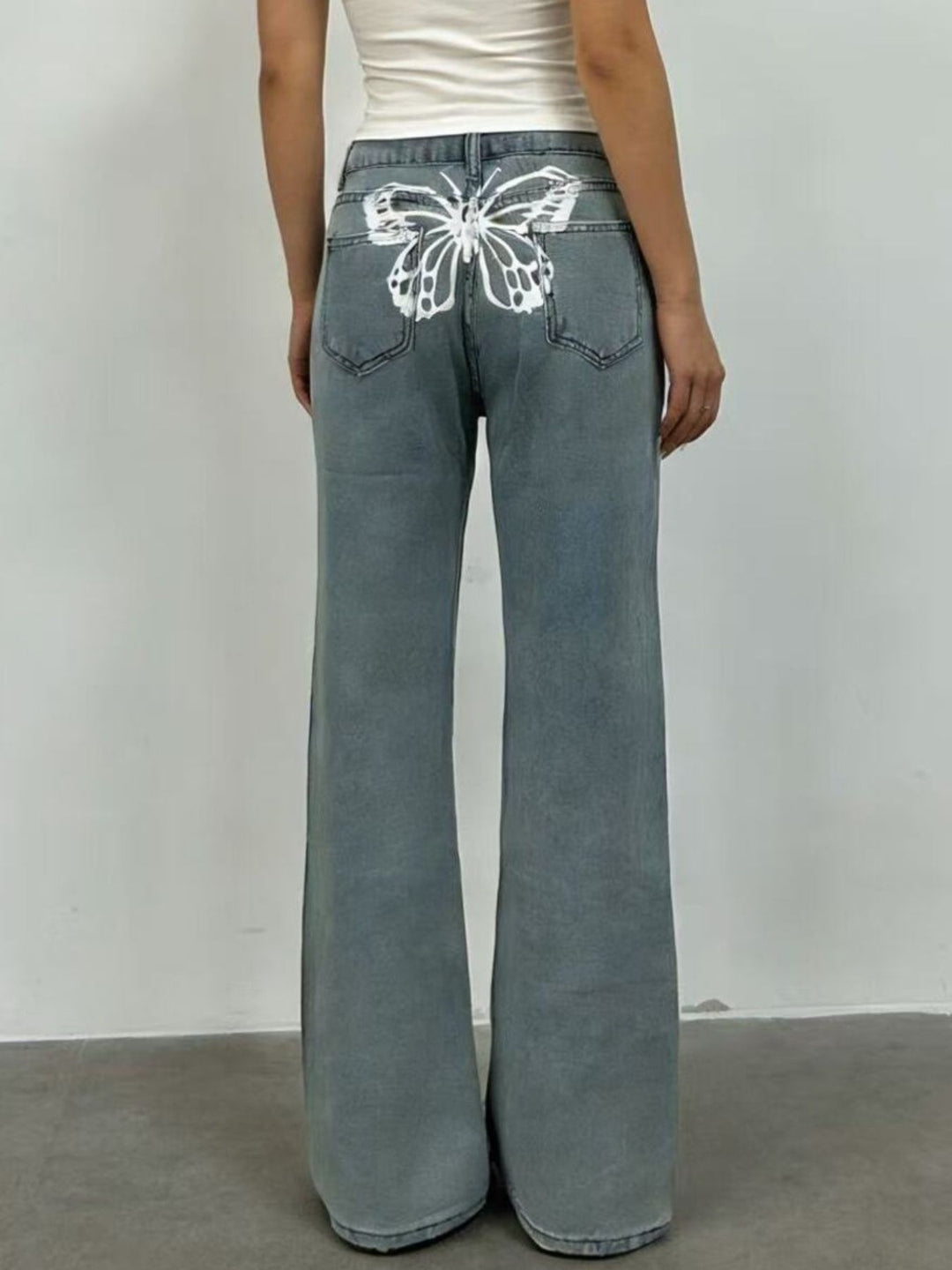 High-rise wide-leg jeans with butterfly back detail