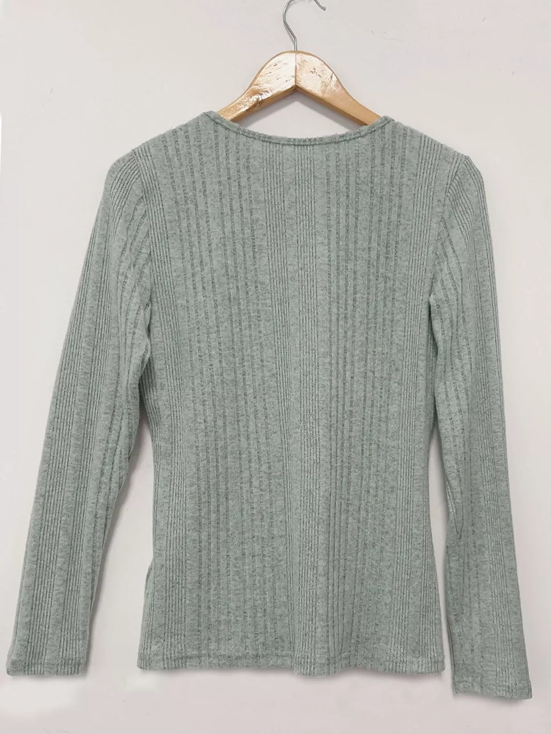 Crisscross V-neck ribbed knit long sleeve top