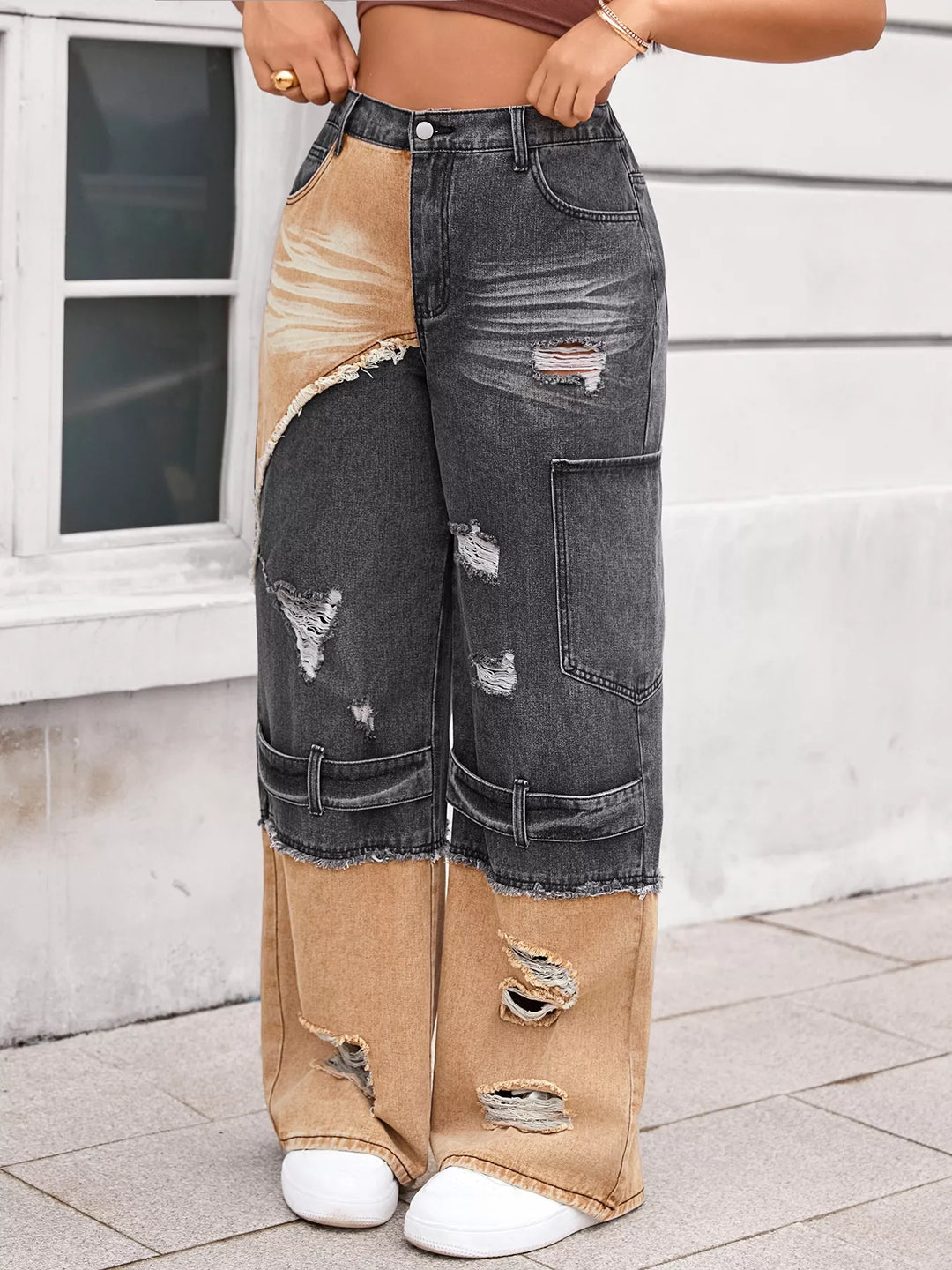 Distressed two-tone wide-leg jeans with raw-edge panels