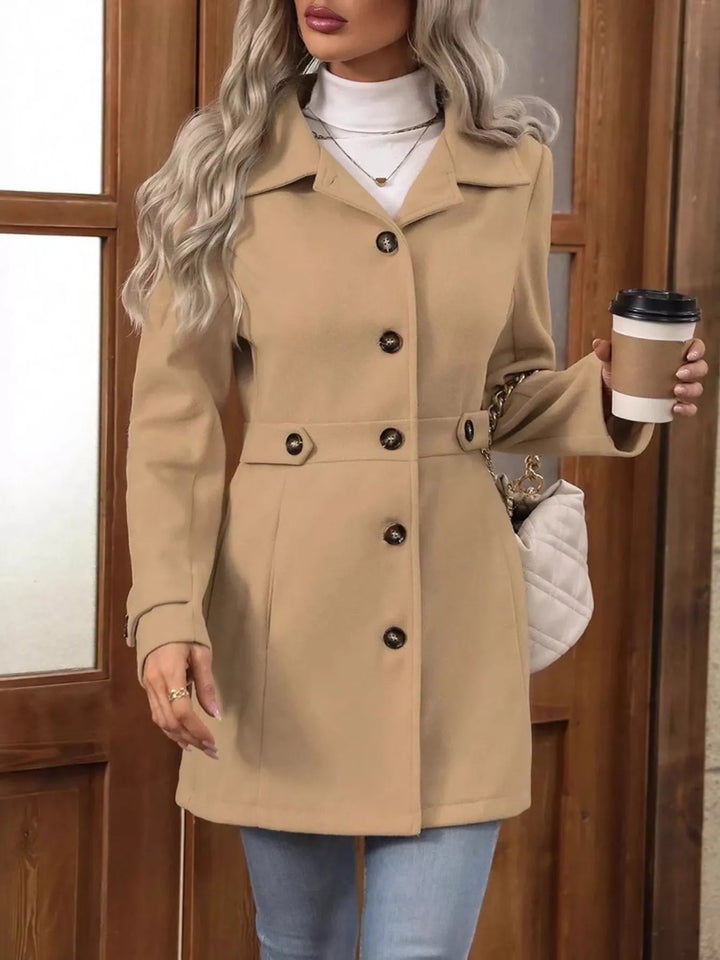 Single-breasted lapel coat with waist tabs and pockets