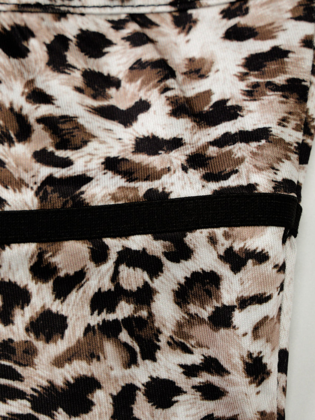 Leopard print cami with lace trim V-neck