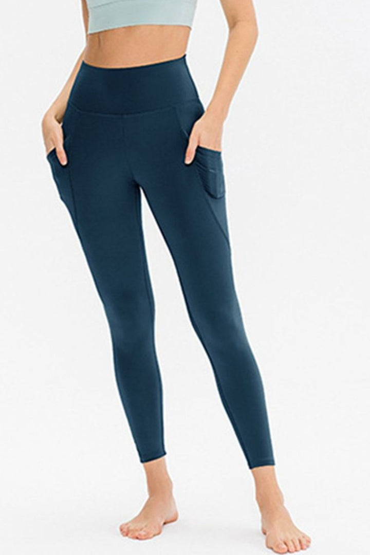 Deep Teal High-waisted active leggings with side phone pockets