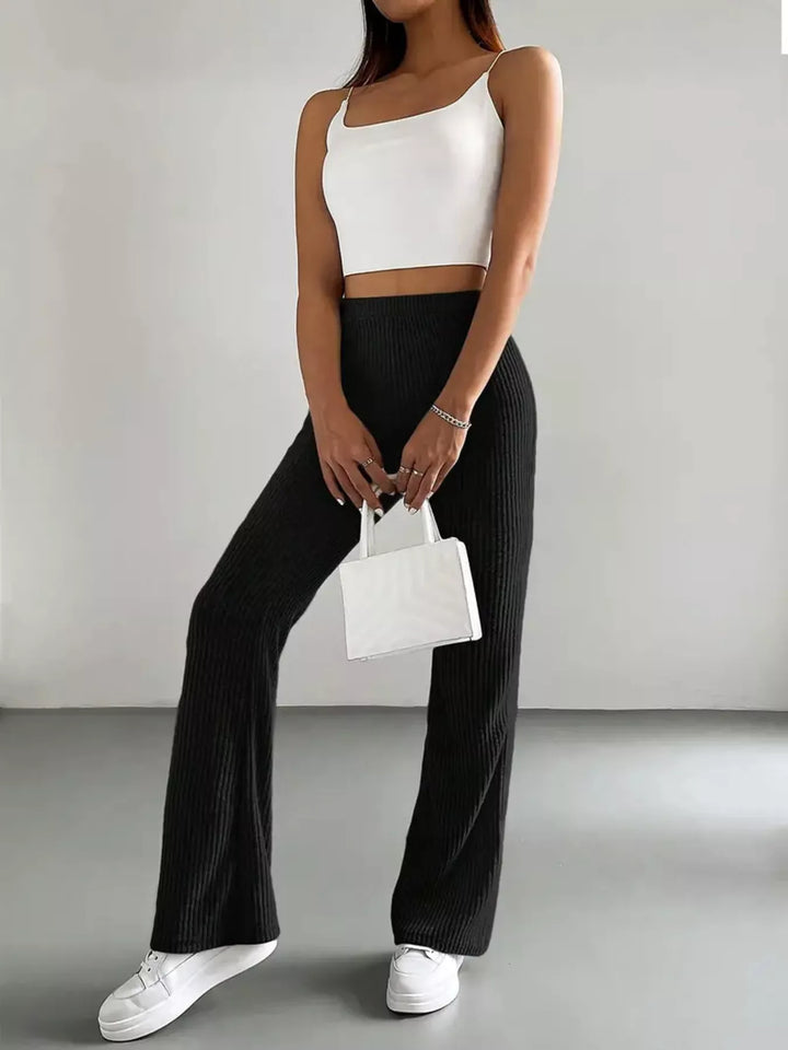 Black High-rise ribbed knit flare pants