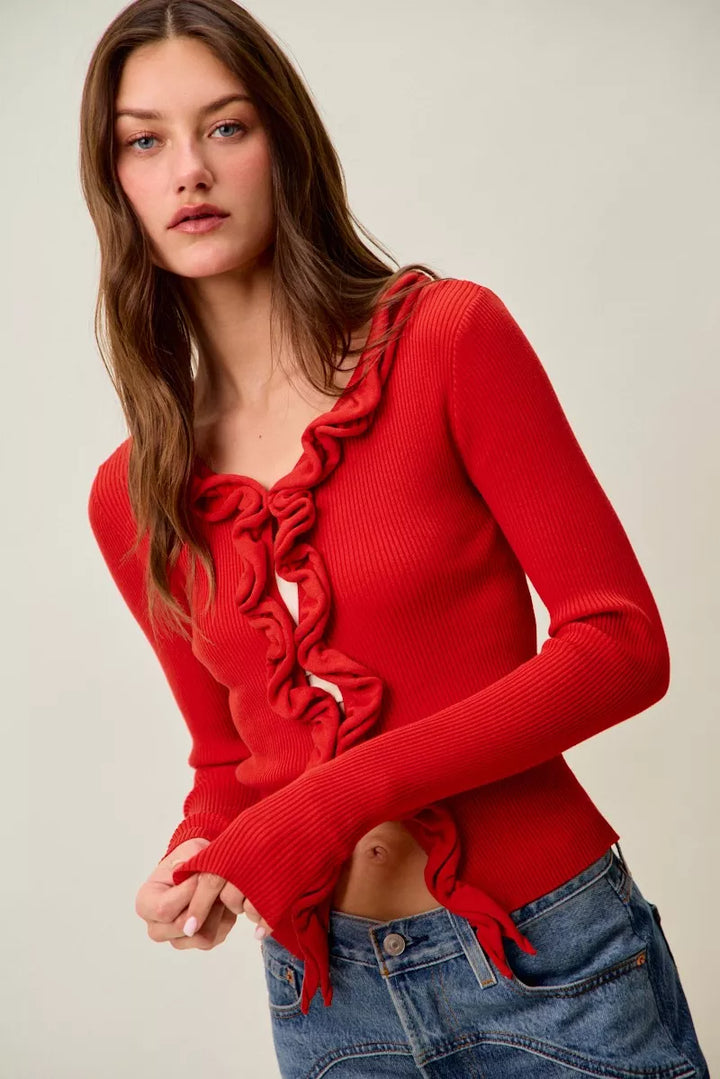Ribbed knit cardigan with cascade ruffle trim
