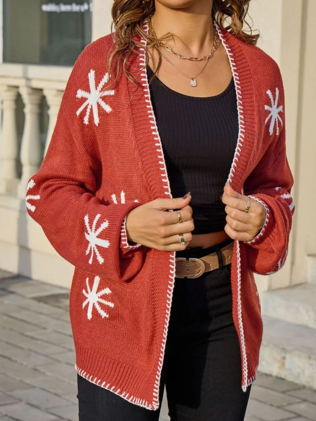 Orange Floral open front knit cardigan with whipstitch trim