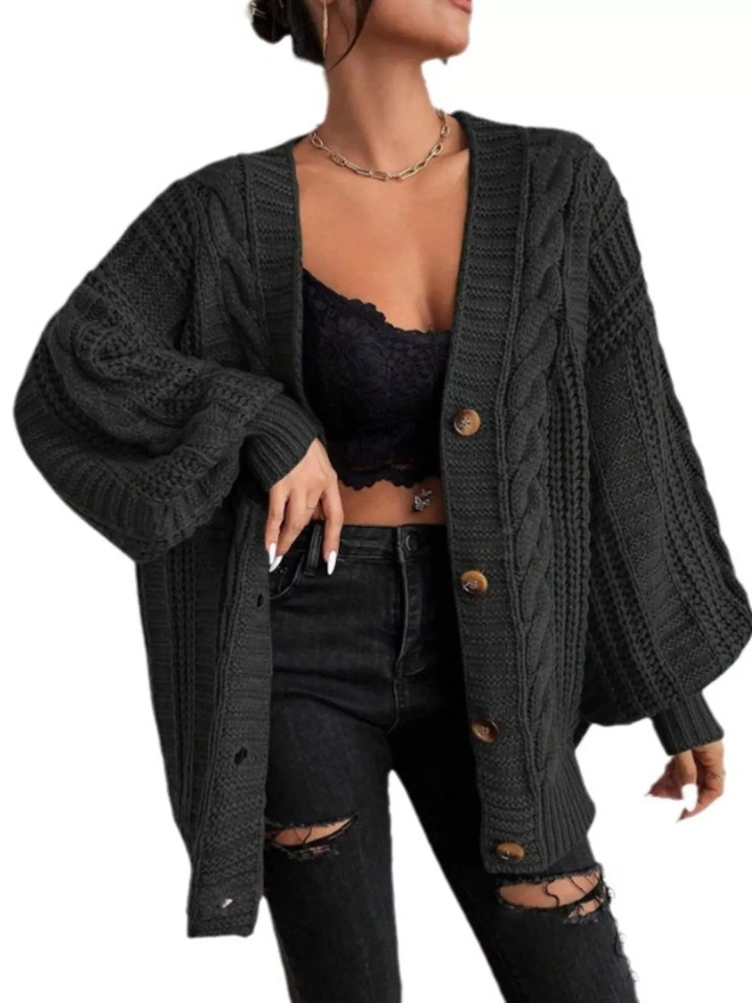 Oversized cable knit button-down cardigan with V-neck
