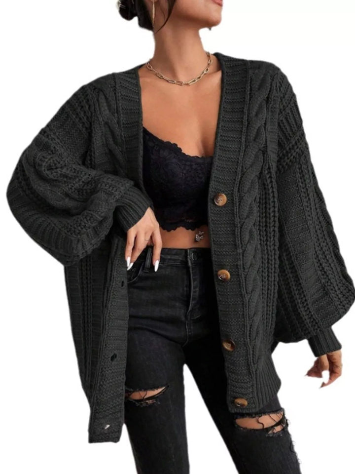 Oversized cable knit button-down cardigan with V-neck