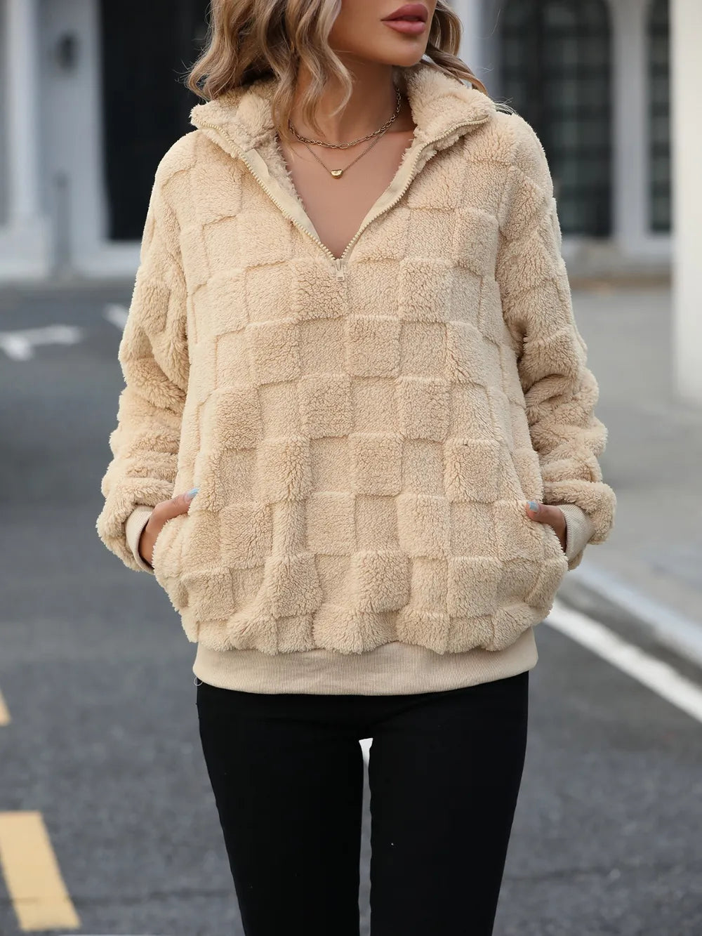 Fuzzy checkered quarter-zip pullover sweatshirt with pockets