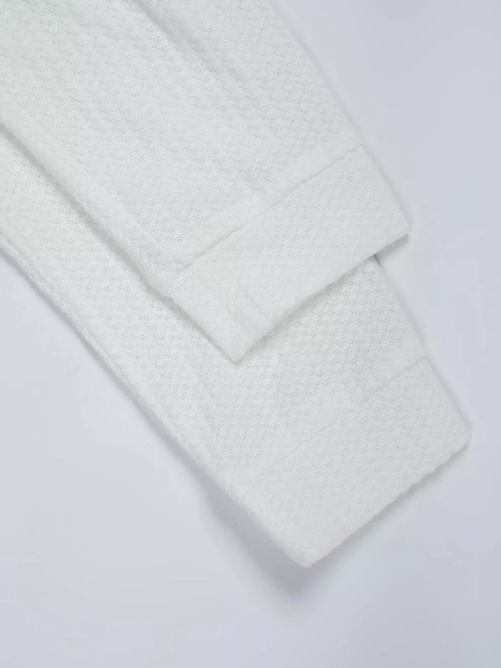 Waffle knit V-neck long sleeve top with ribbed trim