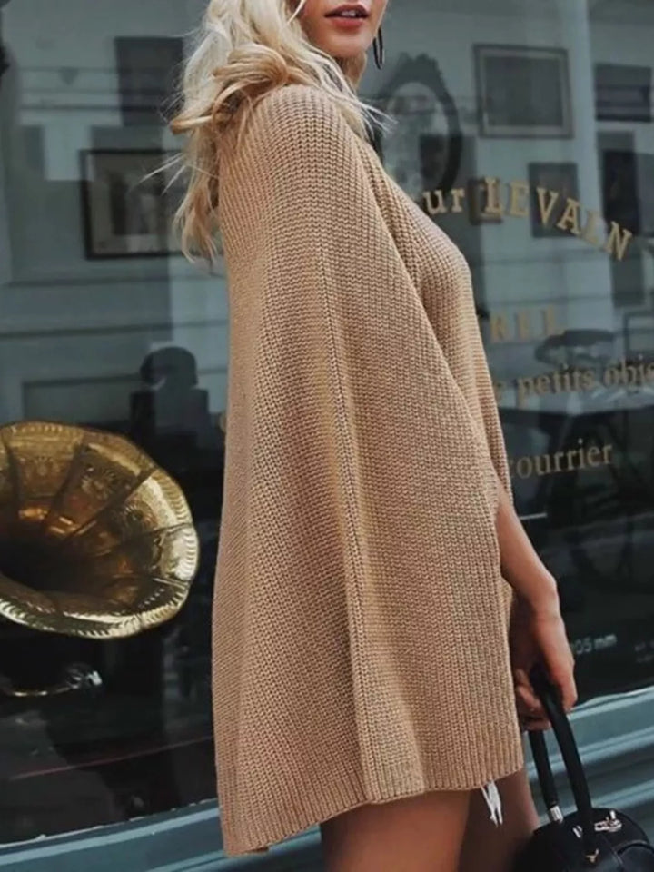 Ribbed turtleneck cape sweater with side slits