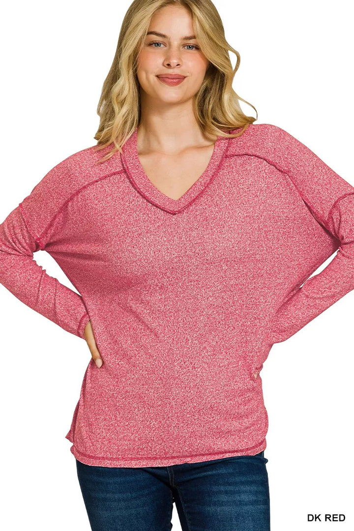 DK RED Exposed seam hi-low melange knit long sleeve top