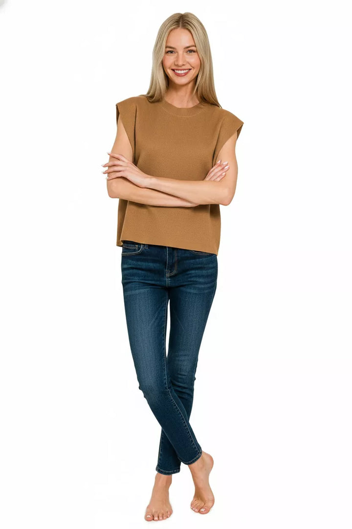 Boxy knit sweater vest with round neck and extended shoulders