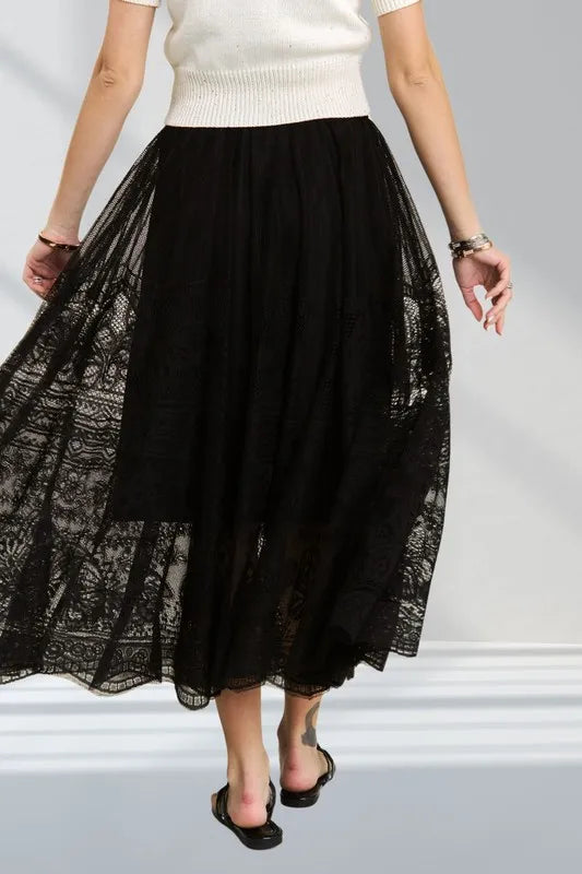 Tiered lace maxi skirt with elastic waist and raw hem