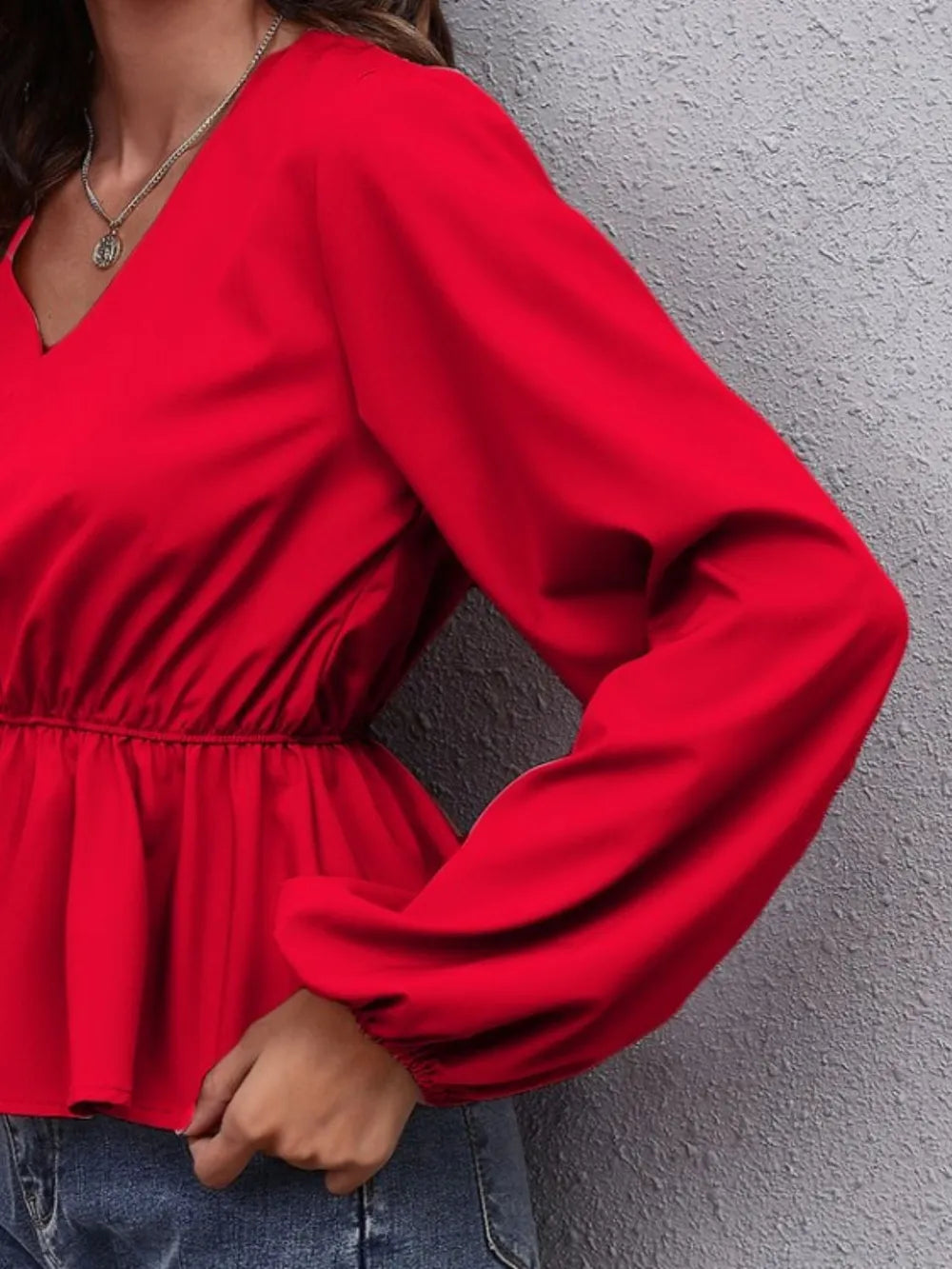 Balloon sleeve peplum blouse with V-neck