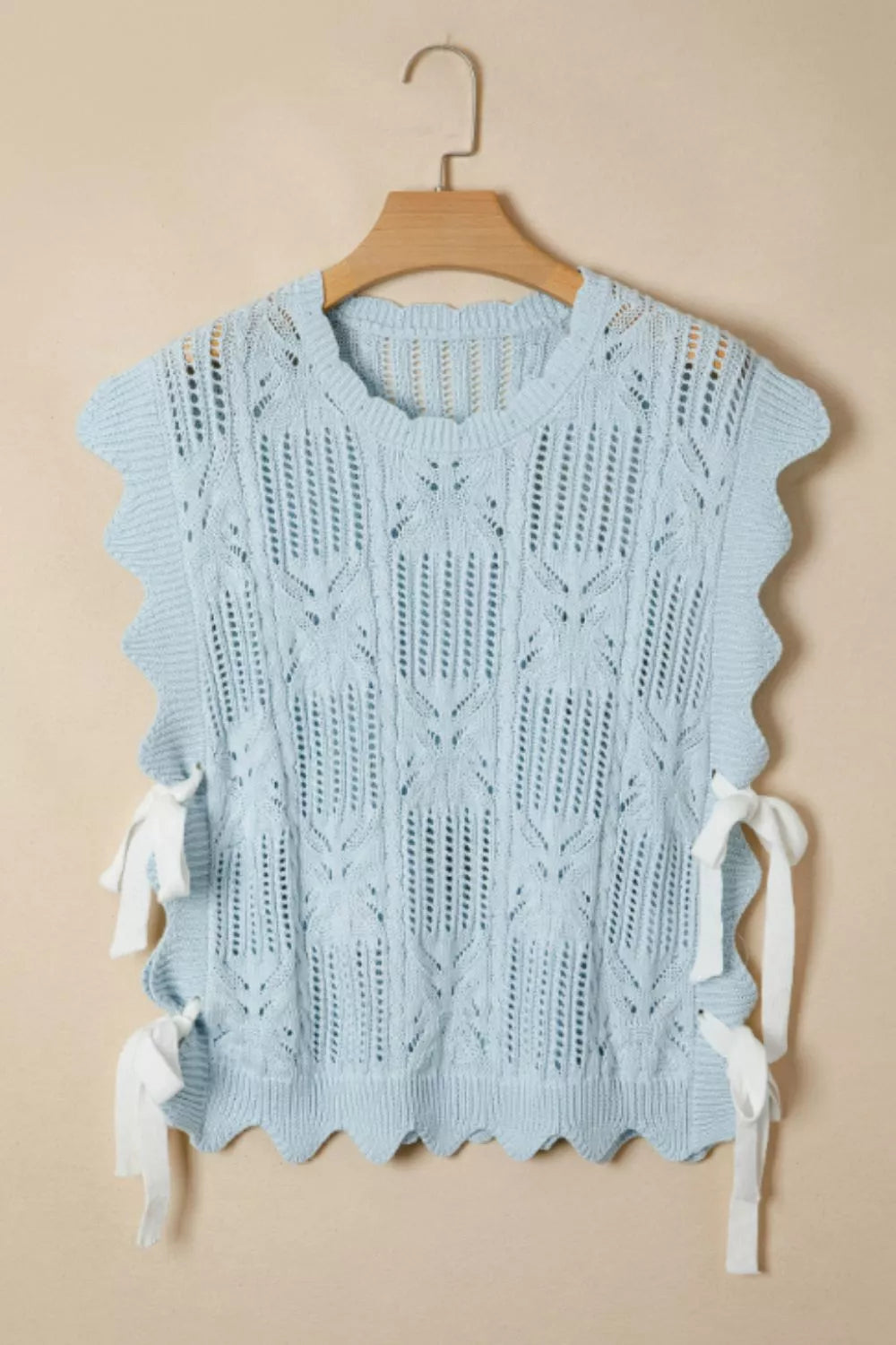Cable-knit openwork sleeveless top with side ties