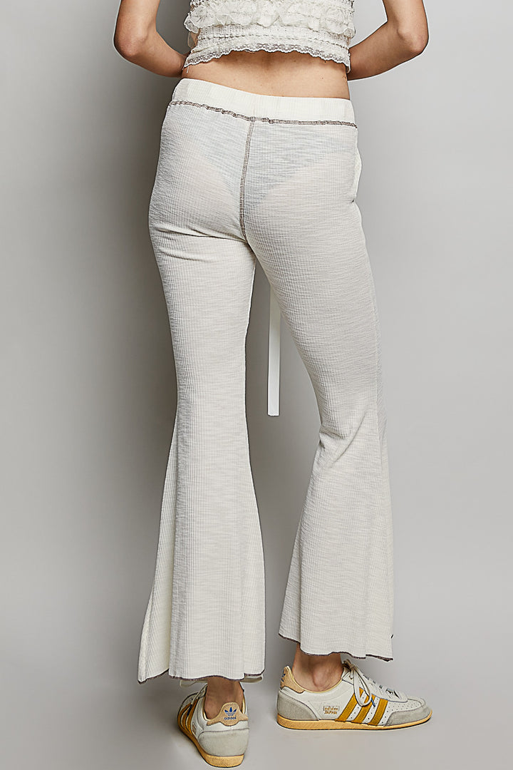 Ribbed knit flare pants with drawstring waist and patch pockets