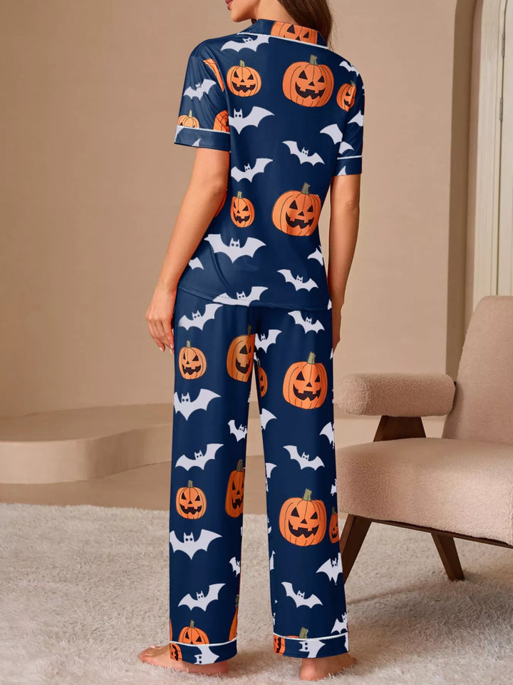 Pumpkin and bat print short sleeve pajama set with piped trim