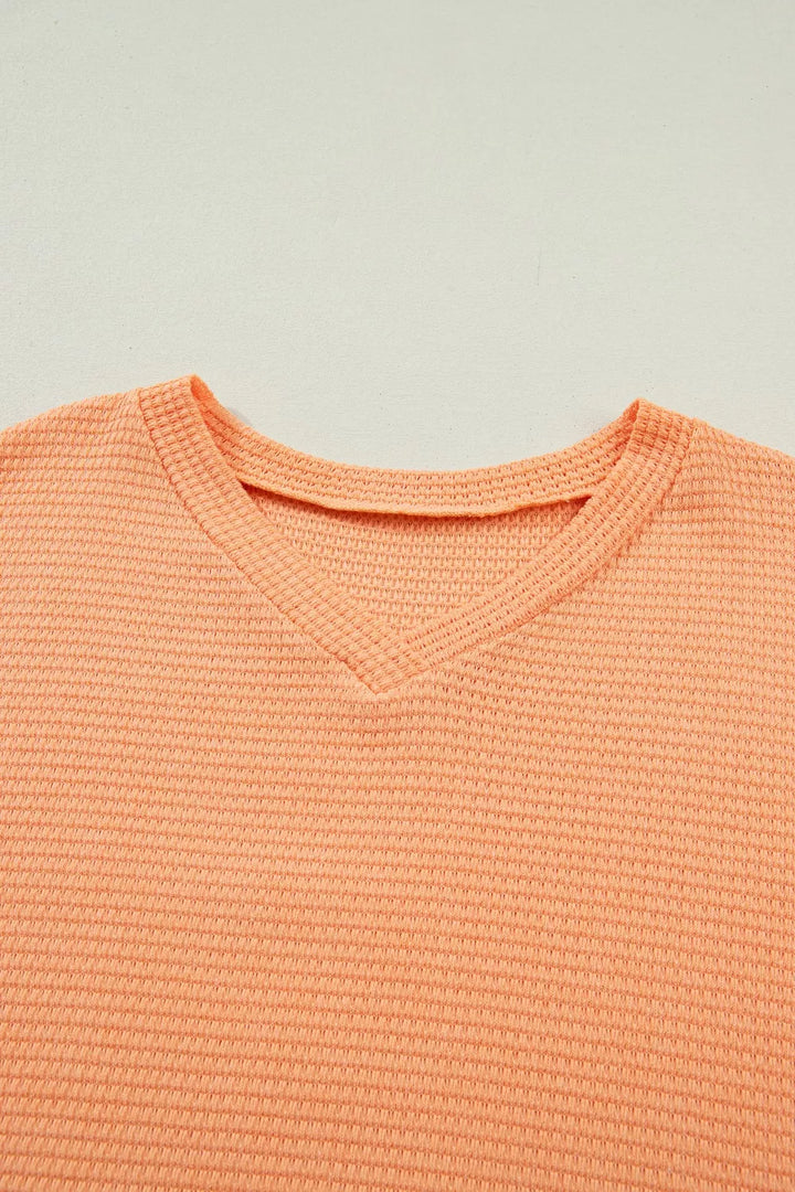 Waffle knit V-neck tee with cuffed short sleeves
