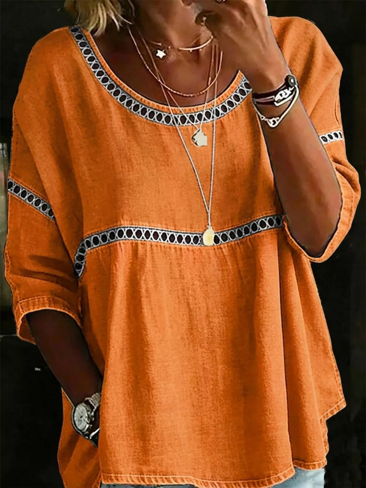 Orange Floral print crochet-trim tunic top with 3/4 sleeves