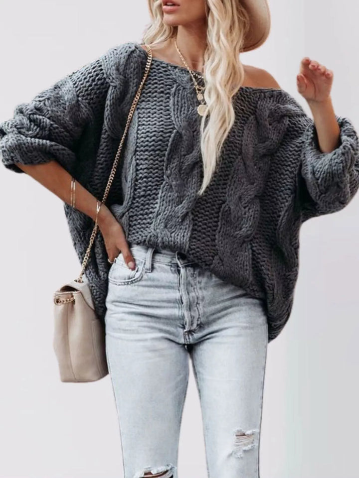 Oversized chunky cable knit pullover with wide boat neck