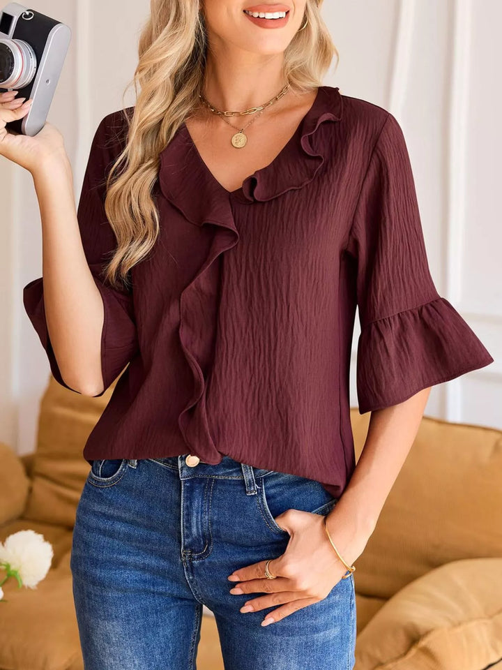 Ruffle trim V-neck blouse with flared bell sleeves
