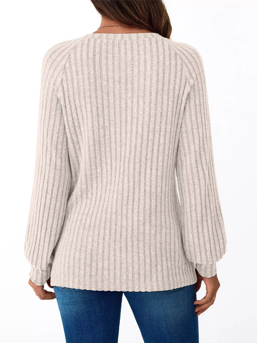 Ribbed knit long sleeve top with decorative shoulder buttons