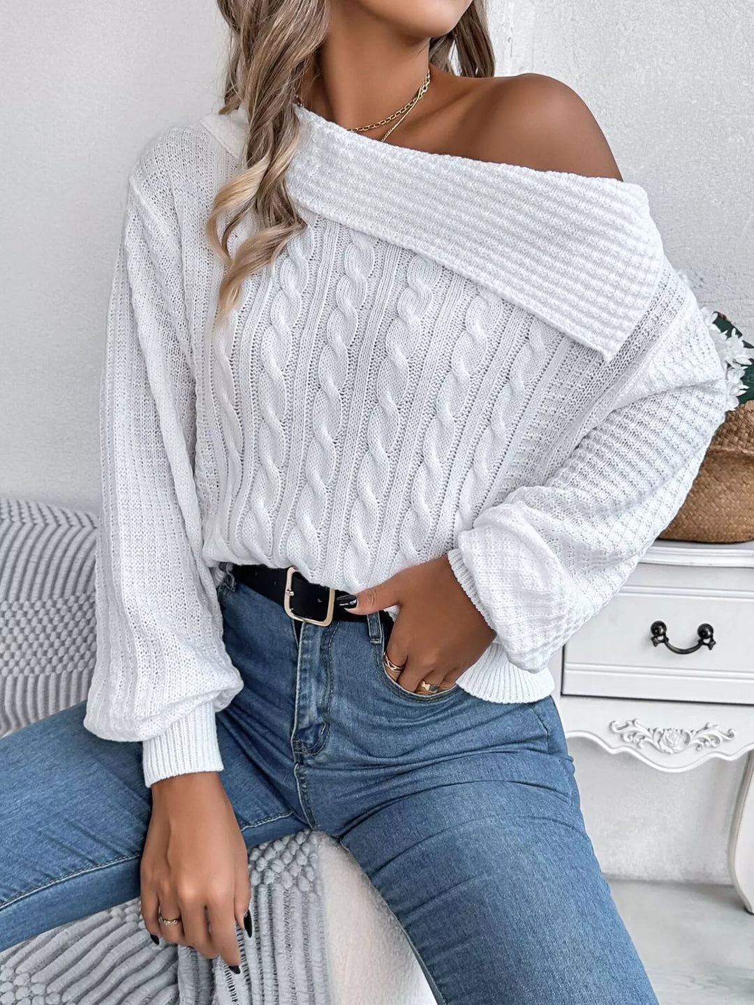 Cable knit one-shoulder sweater with fold-over ribbed collar